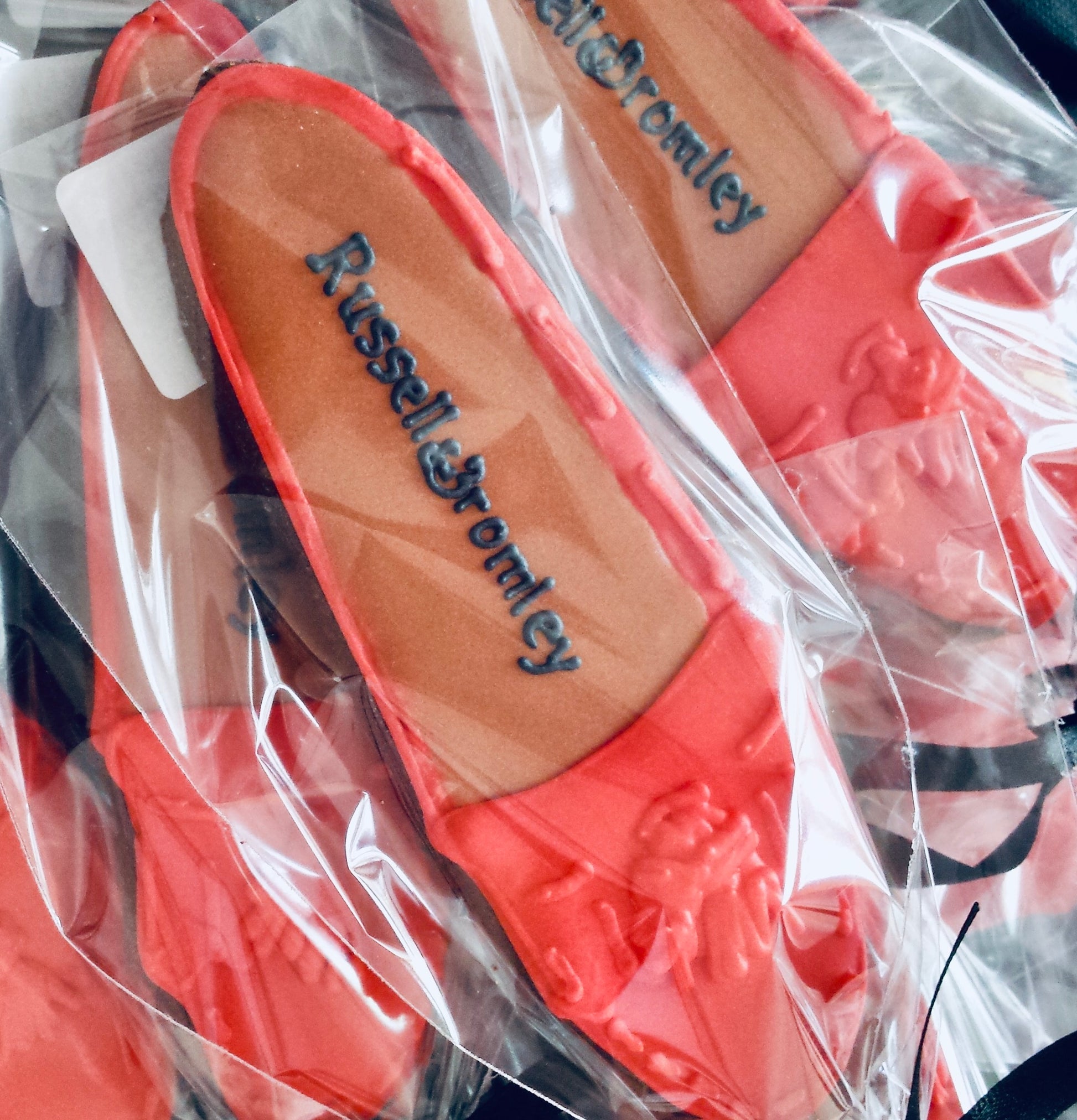 Red shoes for Russell and Bromley London. individually wrapped shoe biscuits for brand launch.