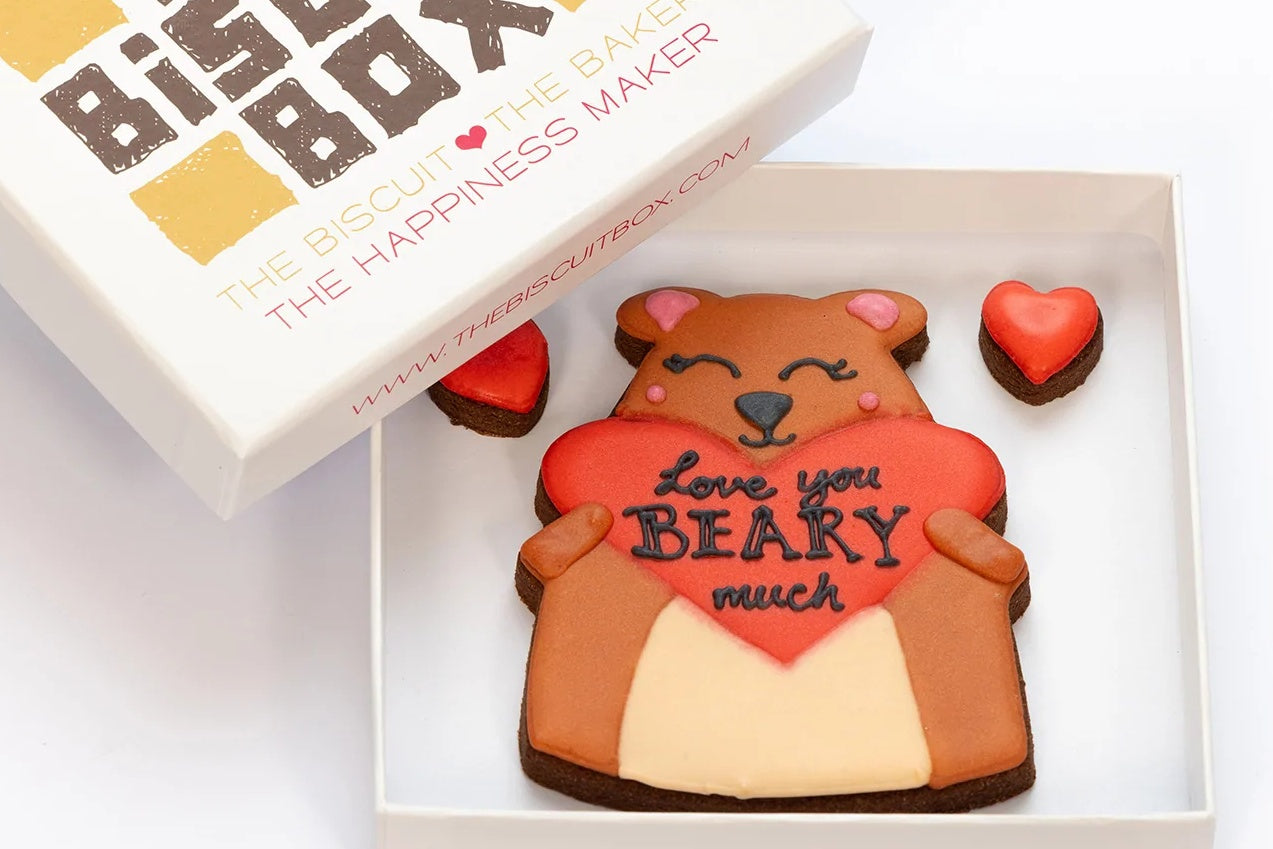 biscuit bear holding a heart which says I love you bear much