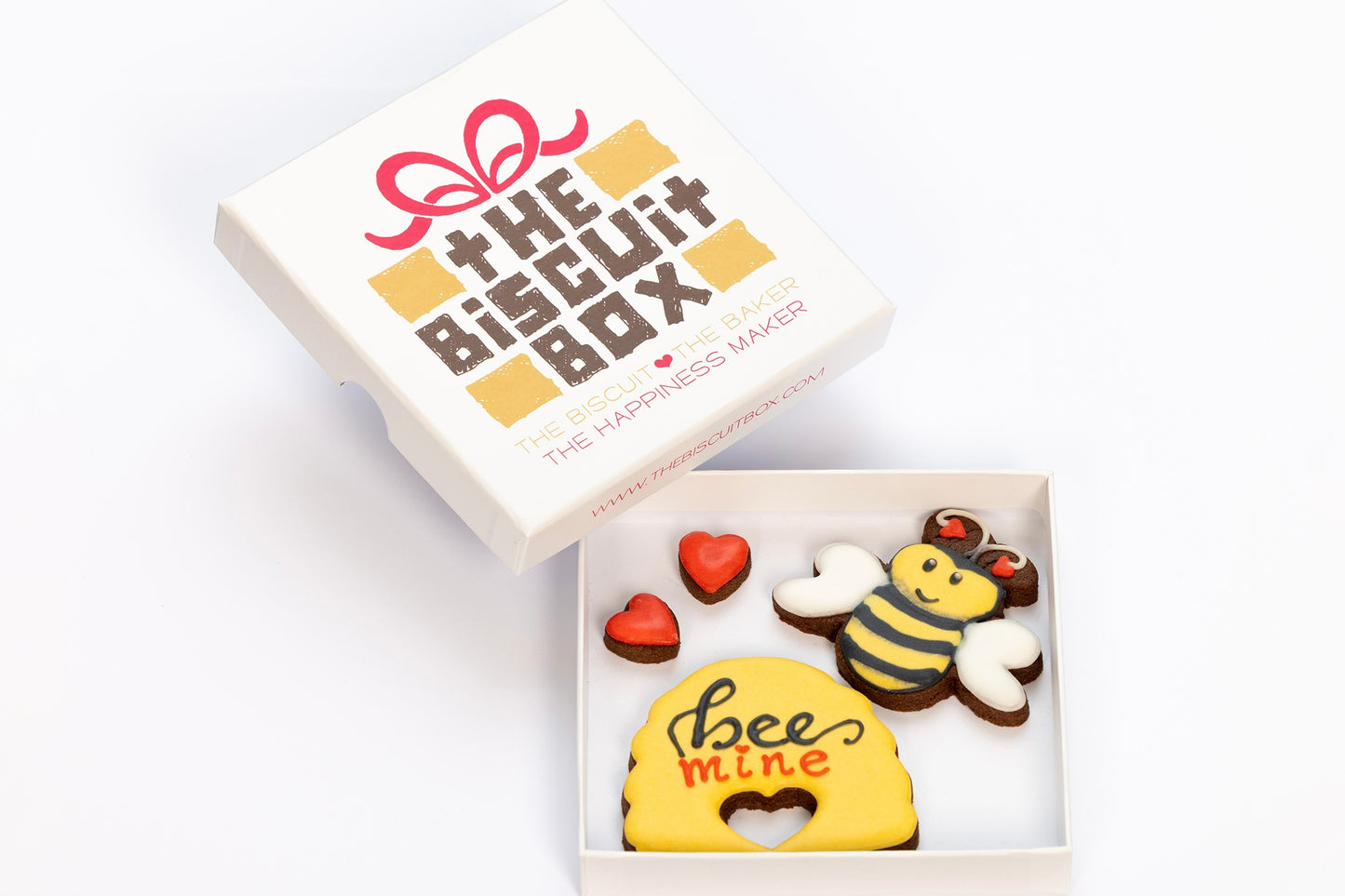 bee valentines day biscuits saying bee mine. in a small letterbox biscuit box
