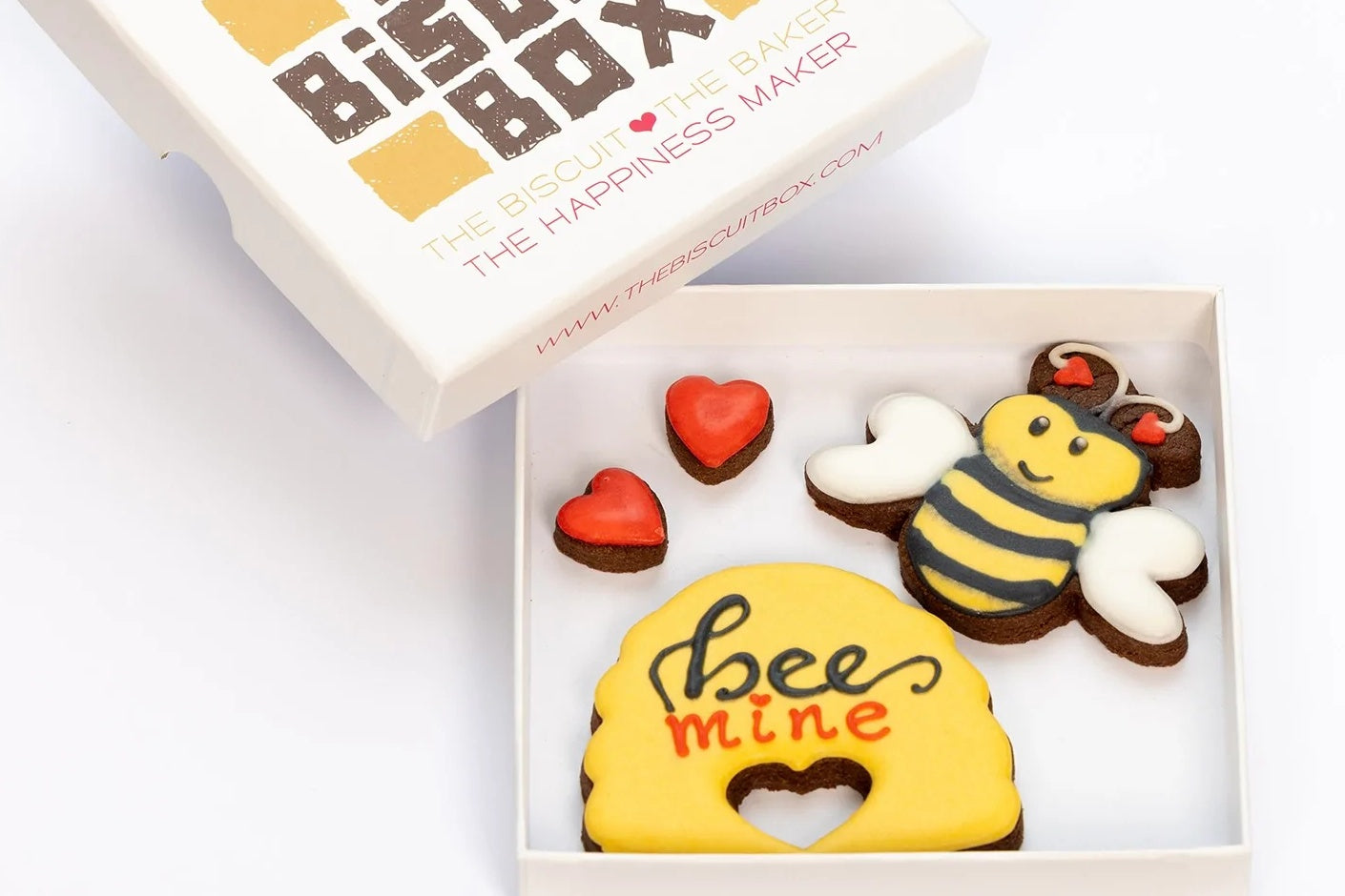 bee mine biscuits for valentines day. yellow bee and beehive biscuits in a box