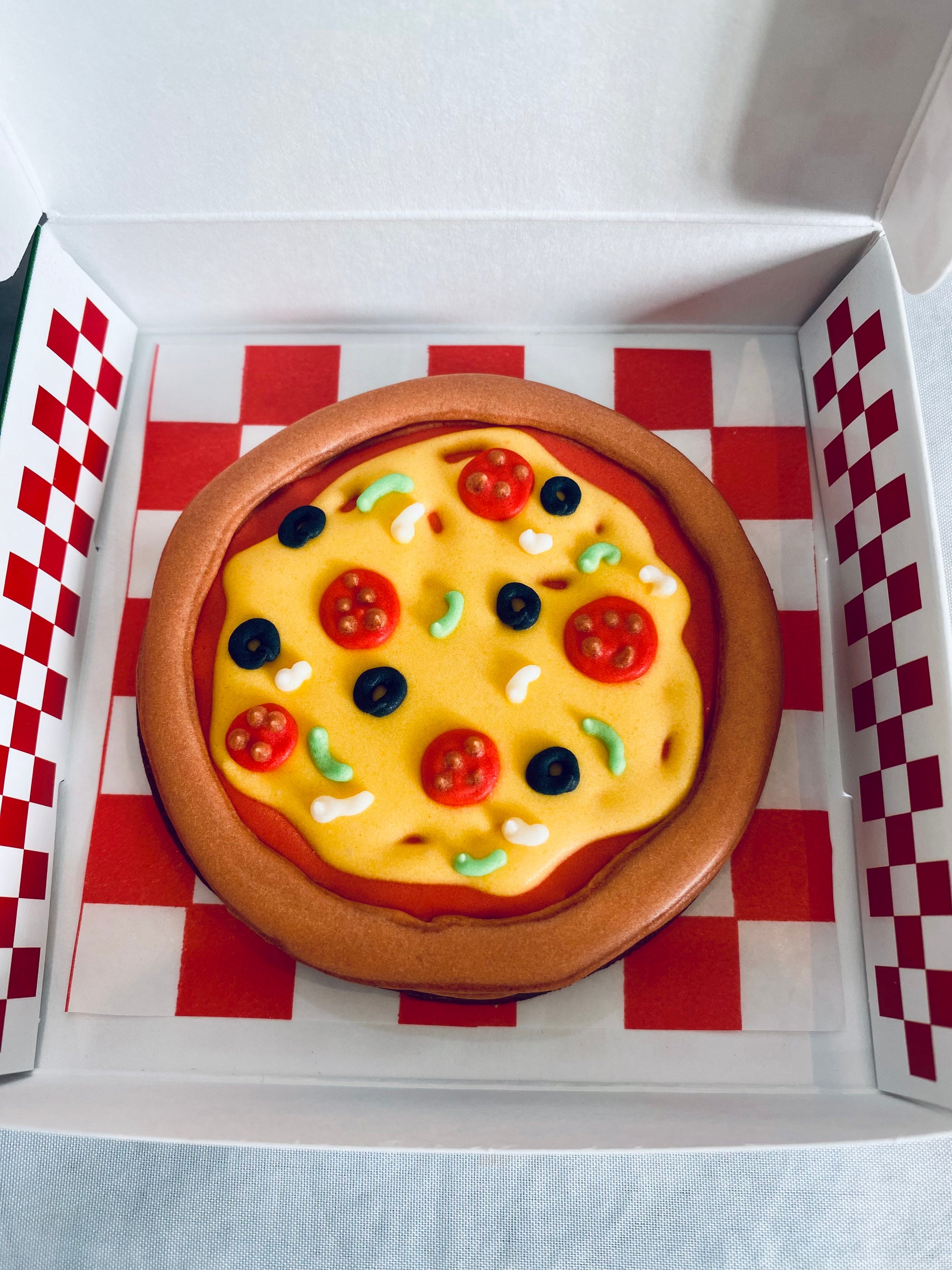 Elf on the shelf biscuit pizza by the biscuit box