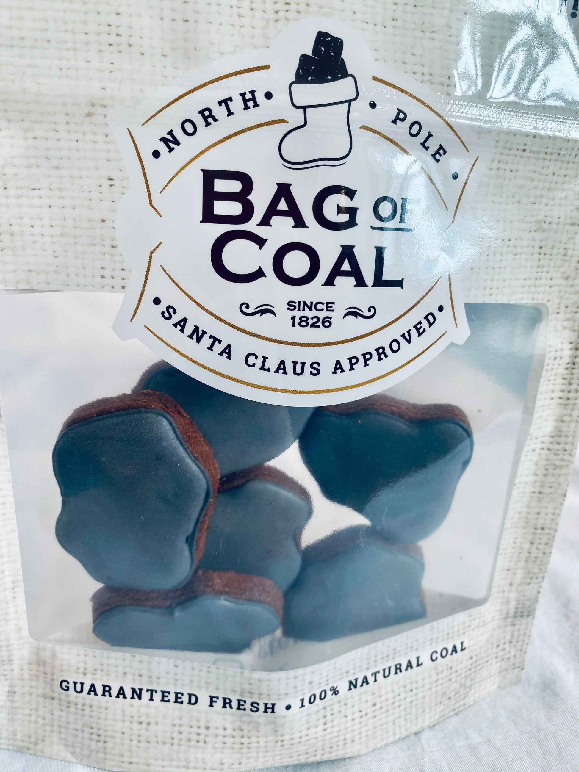 coal biscuits in a bag for a naughty list gift