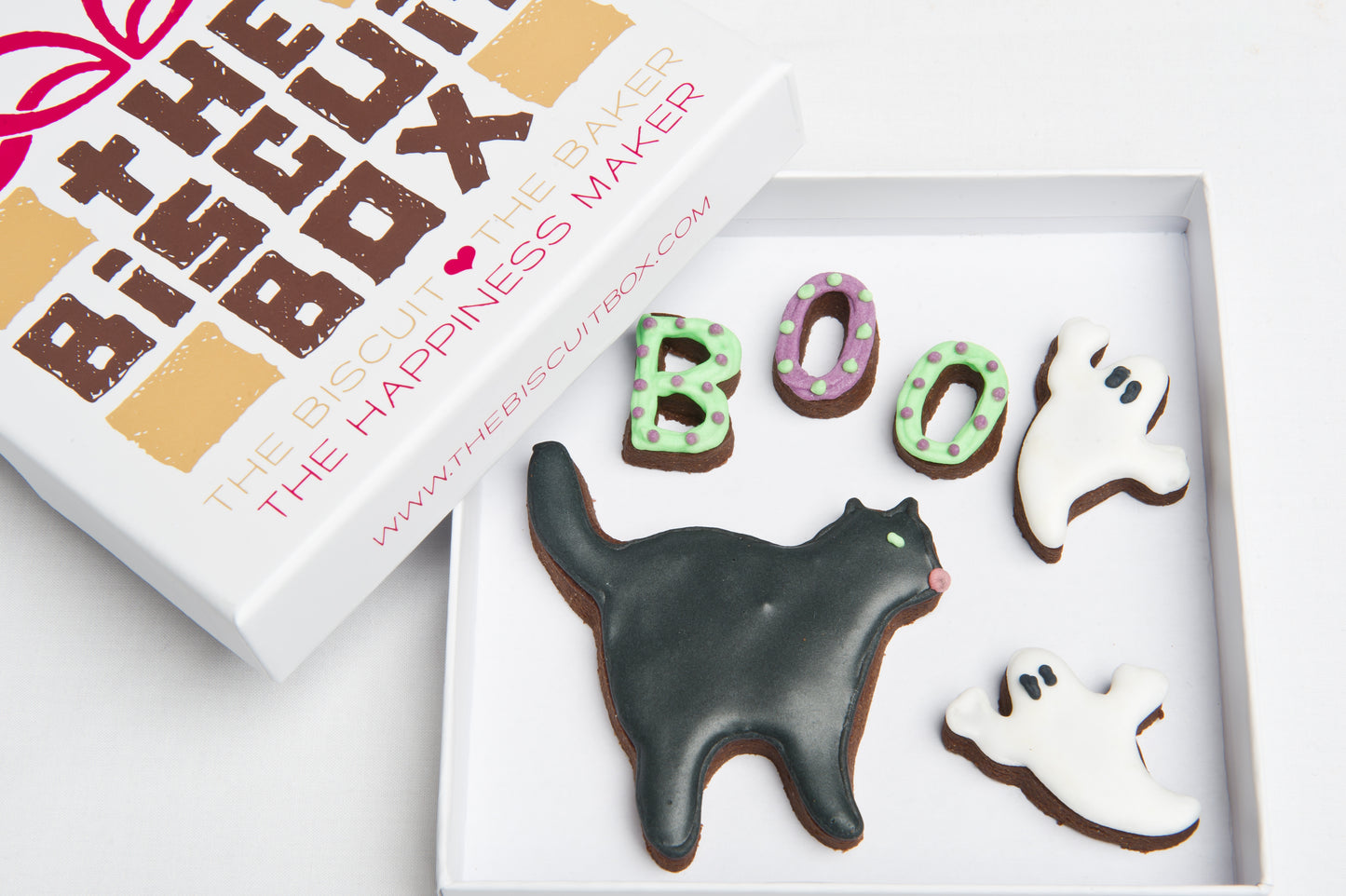 biscuit box with black cat, BOO mini biscuits and mini ghosts. hand iced onto biscuits, in a branded box