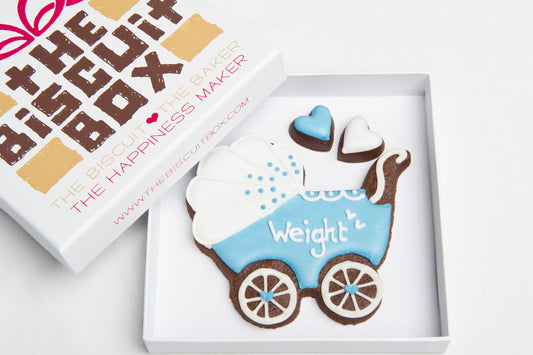 blue pram biscuit for new baby boy gift, two mini heart biscuits displayed in biscuit card