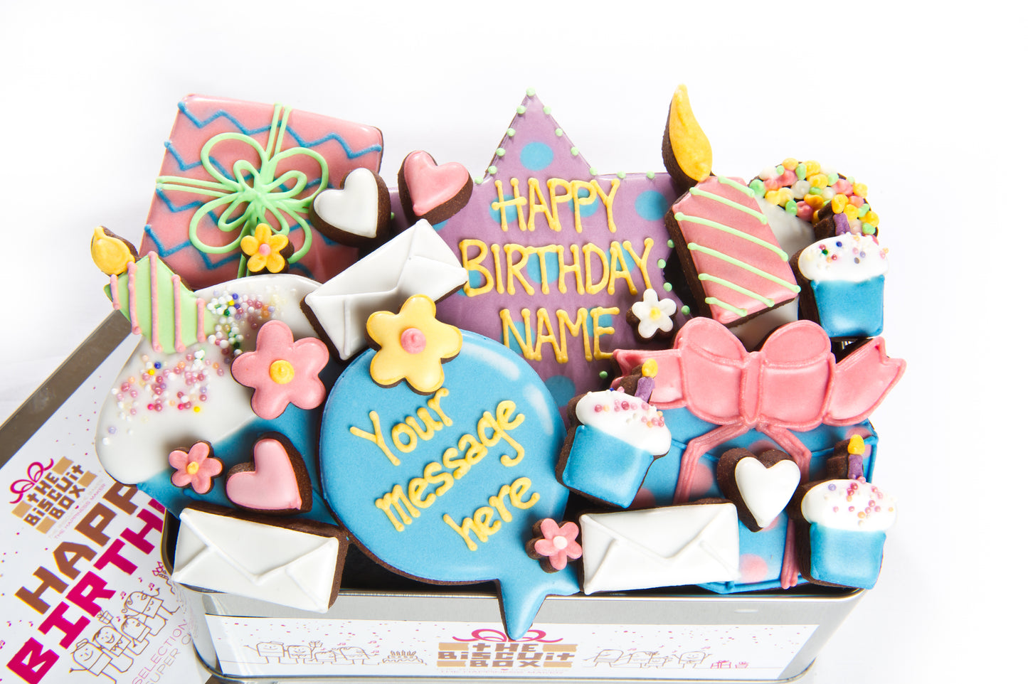 birthday biscuit gift in a tin. Hand iced birthday selection of biscuits, personals 18th birthday, 21st birthday, 50th birthday on the balloon biscuit. Happy birthday message.
